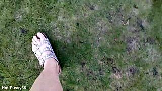 She slips off her flip-flops for a barefoot outdoor tease in the fields