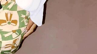 pregnant hijab helper relaxes in bedroom comfort