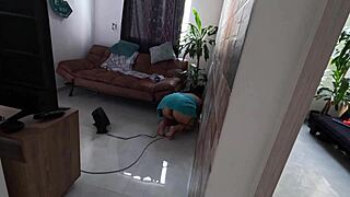 whoops, the cleaning lady bends over unaware on camera