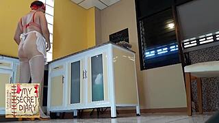 naked housekeeper bakes nude with bare tits and ass out