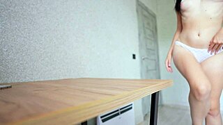 kinky babe rubs shaved pussy on desk swaps wet panties