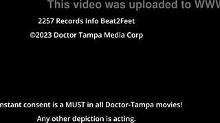 giggles teases with tattooed feet in sexy high heels close up