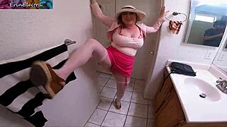 Mature babe catches guy jerking off in bathroom and strokes him dry