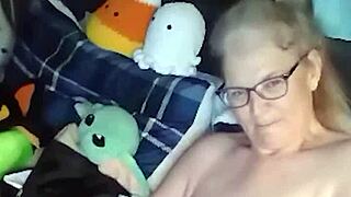 Mature milf with saggy big natural tits does naked yoga then masturbates wildly