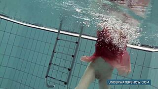 Katya Okuneva teases in red dress by the pool