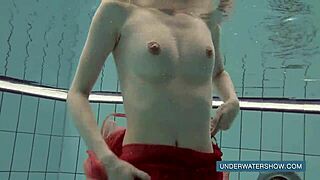 Katya Okuneva teases in red dress by the pool