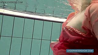 Katya Okuneva teases in red dress by the pool