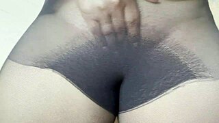 Teen babe exposes wet pussy in see-through pantyhose