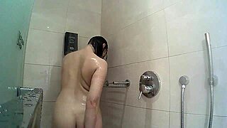 naked bound girl steams up hotel shower hidden cam