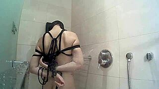naked bound girl steams up hotel shower hidden cam