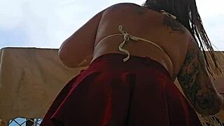 naughty exhibitionist FLASHES big skirt ass wildly on open balcony