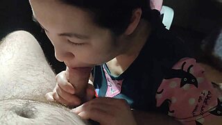 korean woman massages throbbing cock with hands and lips to mouth cum