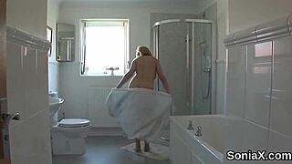 adulterous british mature sonia flashes her huge lingerie-covered tits