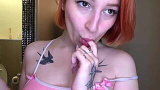Pretty teen teases with toys in steamy shower solo