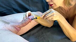 domina milf toys huge cock to explosive cum spurts on saggy tits