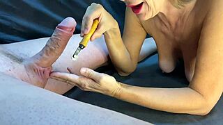 domina milf toys huge cock to explosive cum spurts on saggy tits