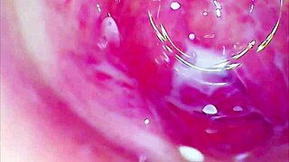 Glass dildo rides deep in tight juicy pussy coaster