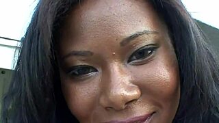 Ebony babe flaunts massive natural tits and nipples