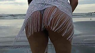 my beautiful pregnant belle seduces beach crowd with belly tease