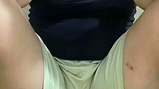 busty housewife plays video game totally naked and teasing