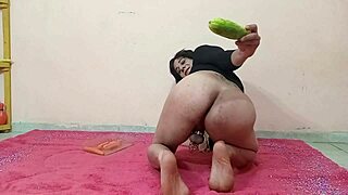 I feel the cucumber stretching my ass so deep it drives me wild inside