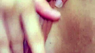 Curvy student teases wet pussy in tight shorts during solo masturbation session