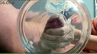 Slowmo cumshot sprays in water