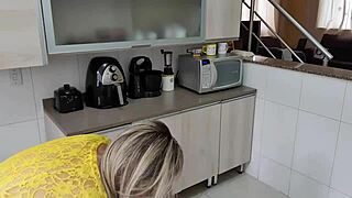 sexy vixen bends over teasing ass tits while cleaning kitchen sensually