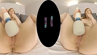 fiery redhead milf grabs her vibrator and shows off those big shaved tits up close