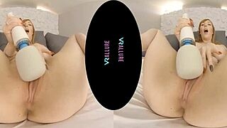 fiery redhead milf grabs her vibrator and shows off those big shaved tits up close