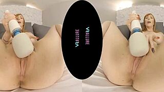 fiery redhead milf grabs her vibrator and shows off those big shaved tits up close