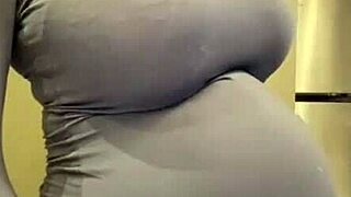 Milf unleashes milky natural tits from red bra tease!