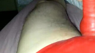 husband in latex suit sheath teases rubber