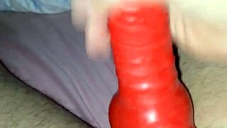 husband in latex suit sheath teases rubber