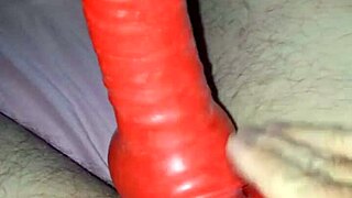 husband in latex suit sheath teases rubber