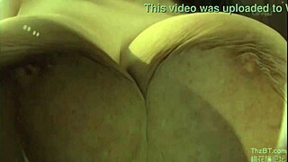 What secrets hide behind hitomi's massive tits as she teases her hard nipples to full areola reveal?