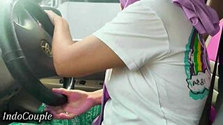 indonesian hijab babe drives while slurping boyfriend's throbbing cock in viral clip