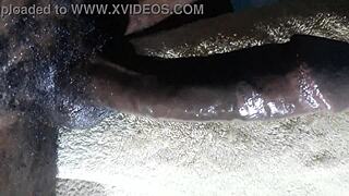 Huge cumshot from Kenyan big black cock handjob closeup