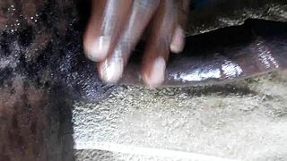 Huge cumshot from Kenyan big black cock handjob closeup