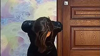 bound crossdresser locked in armbinder gag awaits intense bondage fate desperately