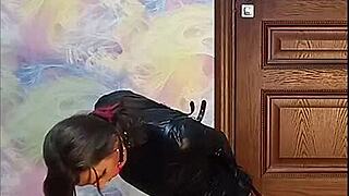 bound crossdresser locked in armbinder gag awaits intense bondage fate desperately