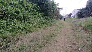 Naughty redhead bares wet pussy sans panties in public park tease