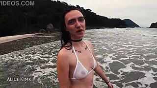 Alice kinks out flashing her skinny african body stripping micro bikini on crowded beach