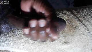 Huge cumshot from Kenyan big black cock handjob closeup