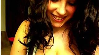 beautiful brunette bends over webcam showing off big tits and deepthroat skills