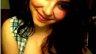 beautiful brunette bends over webcam showing off big tits and deepthroat skills