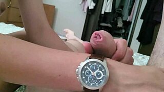 Teen wristjob fetish ends with massive cumshot on watch