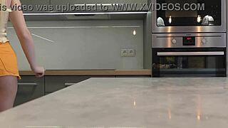 i'm the long-legged blonde in heels and miniskirt flashing ass in kitchen