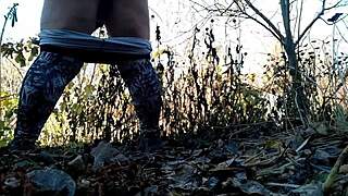 Hey, watch this mature beauty piss wildly in nature?
