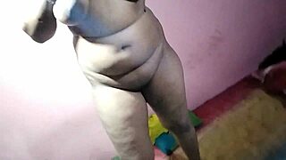 Curvy wife parades saggy huge tits teasingly before husband
